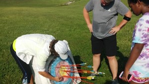 Weber reviewing Carey Miller's top score of 87xx.  Miller is active in the Sundance Apt. Community as the manager where archery is sponsored.  She believes everyone should take advantage of opportunities and she certainly has taken a Top Shot at this one!