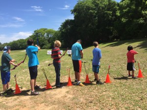 The field of elite male archery fitness competitors.